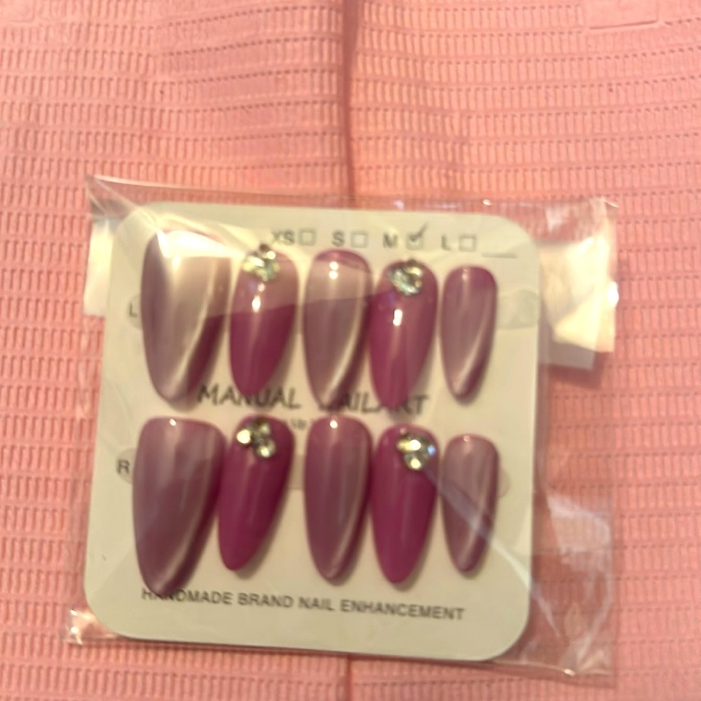 Beautiful pink and purple cat eye nail design